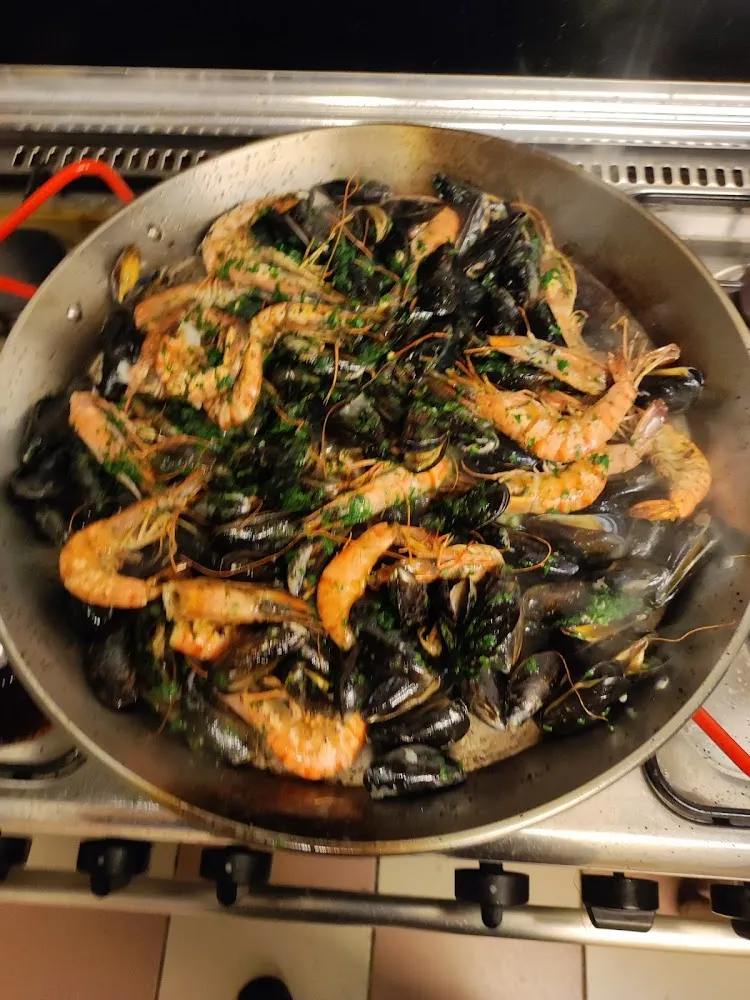 Poêle Persillé Au Fruits de Mer